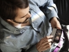 X2_Man_operating_phone_1