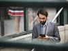 X2_Man_operating_phone_2