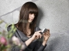 X2_Women_watching_video
